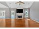 Bright living room with fireplace, lake view, and access to patio at 2445 Ridgelake Dr, Villa Rica, GA 30180
