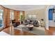 Relaxing living room featuring modern furnishings and a large plant at 2445 Ridgelake Dr, Villa Rica, GA 30180