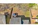 Aerial view of a fenced backyard with a patio set under an umbrella offering outdoor relaxation at 4342 Richmond Nw Pl, Acworth, GA 30101