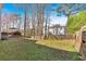 Spacious backyard with a well-maintained lawn and a deck for outdoor enjoyment at 4342 Richmond Nw Pl, Acworth, GA 30101