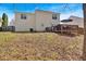 Large backyard showcasing a deck, green lawn, and privacy fence at 4342 Richmond Nw Pl, Acworth, GA 30101