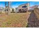 Well-landscaped backyard with deck, mature trees, and fencing for privacy and serenity at 4342 Richmond Nw Pl, Acworth, GA 30101