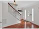 Entryway with hardwood floors, staircase, and white trim, next to the front door at 4342 Richmond Nw Pl, Acworth, GA 30101