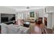 Spacious living room features hardwood floors, fireplace, and large windows at 4342 Richmond Nw Pl, Acworth, GA 30101