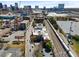 High-angle view showcasing the building, adjacent railroad tracks, and surrounding cityscape at 490 Marietta Nw St # 105, Atlanta, GA 30313