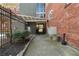 Exterior entrance featuring a gated entrance and well-maintained landscaping, offering a secure and welcoming entry at 490 Marietta Nw St # 105, Atlanta, GA 30313