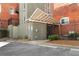 Exterior entryway featuring a gated entrance and well-maintained landscaping, offering a secure and welcoming entry at 490 Marietta Nw St # 105, Atlanta, GA 30313