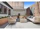 Charming courtyard with cozy seating, a water feature, and exposed brick, creating a serene outdoor living space at 490 Marietta Nw St # 105, Atlanta, GA 30313