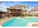 Enjoy the backyard with a gazebo and pool at 500 Poplar Creek Xing, Canton, GA 30114