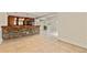 Basement featuring a stone bar with wooden countertop and ample space for entertaining at 500 Poplar Creek Xing, Canton, GA 30114