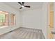 Cozy bedroom with carpet flooring, natural lighting, and access to a private balcony at 500 Poplar Creek Xing, Canton, GA 30114