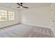 Spacious carpeted bedroom with natural light, blank canvas to create your dream space at 500 Poplar Creek Xing, Canton, GA 30114