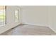 Bright bedroom with neutral carpet and large windows offering natural light at 500 Poplar Creek Xing, Canton, GA 30114