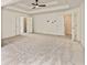 Very spacious bedroom features double doors leading to an ensuite bathroom and other rooms at 500 Poplar Creek Xing, Canton, GA 30114