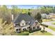 Attractive suburban home featuring a manicured front lawn and a mix of brick and siding at 500 Poplar Creek Xing, Canton, GA 30114