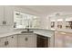 Eat-in kitchen features granite countertops, stainless steel appliances, and open windows at 500 Poplar Creek Xing, Canton, GA 30114