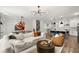 Open concept living room, kitchen and dining area with modern furnishings at 234 Retreat Ln, Canton, GA 30114