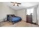 Bedroom featuring a large window and vaulted ceiling at 241 Quail Run, Roswell, GA 30076