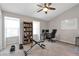 Bonus room featuring vaulted ceiling, bookshelf and a home gym area at 241 Quail Run, Roswell, GA 30076