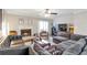 Inviting living room with a fireplace, sliding glass doors, and comfortable seating at 241 Quail Run, Roswell, GA 30076