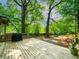 Spacious backyard featuring a wood deck with a grill and seating at 646 Catherine Sw St, Atlanta, GA 30310