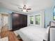 Serene main bedroom featuring hardwood floors, natural light, and ample closet space at 646 Catherine Sw St, Atlanta, GA 30310