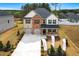 Lovely, modern home shows great curb appeal, an open yard and a two-car garage at 802 Major Oak Ct, Villa Rica, GA 30180