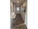 Light and bright entryway features wood-look floors and access to other rooms at 802 Major Oak Ct, Villa Rica, GA 30180