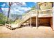 Multi-level deck with built-in seating, providing ample space for outdoor entertaining at 1295 Maple St Se, Conyers, GA 30013