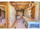 Unfinished basement featuring a workspace and exposed utilities perfect for customization at 1295 Maple St Se, Conyers, GA 30013
