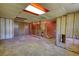 A basement with exposed framing and a staircase at 1295 Maple St Se, Conyers, GA 30013