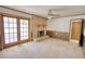 Inviting living room with brick fireplace and natural light at 1295 Maple St Se, Conyers, GA 30013