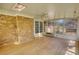 A sunroom featuring wood floors and many windows to the backyard at 1295 Maple St Se, Conyers, GA 30013
