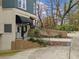 Modern building featuring a covered entrance, landscaped accents and convenient ramp access at 140 Alden Nw Ave # 201, Atlanta, GA 30309