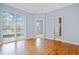 This living room has hardwood floors, a balcony, and access to the bathroom at 140 Alden Nw Ave # 201, Atlanta, GA 30309