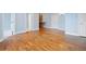 Living room showcasing hardwood floors, light blue walls, and an open-concept design at 140 Alden Nw Ave # 201, Atlanta, GA 30309