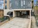Exterior image of the building's parking garage entrance with a black awning at 140 Alden Nw Ave # 201, Atlanta, GA 30309