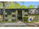 Exterior shot of building with greenery, multi-level decks, and visible stairs at 178 Barone Nw Pl, Atlanta, GA 30327