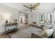 Cozy living room with hardwood floors, neutral tones, decor, and views into an entryway and sitting nook at 178 Barone Nw Pl, Atlanta, GA 30327