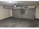 Spacious garage featuring an automatic door opener and concrete flooring at 3518 Sable Glen, South Fulton, GA 30349