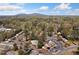 Community aerial view featuring community townhomes with mature trees and community pool at 382 Leisure Sw Ct, Marietta, GA 30064