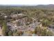 Scenic aerial view of a residential community with mature trees and well-maintained landscaping, offering a serene living environment at 382 Leisure Sw Ct, Marietta, GA 30064