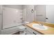 Bright bathroom featuring white tiling in the shower and modern vanity at 382 Leisure Sw Ct, Marietta, GA 30064