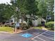 Community clubhouse with well-maintained landscaping and accessible parking at 382 Leisure Sw Ct, Marietta, GA 30064
