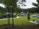 Beautiful community park with tennis courts, covered picnic areas, playground and green space at 382 Leisure Sw Ct, Marietta, GA 30064