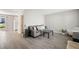 Inviting living room with modern flooring, neutral paint, and plenty of natural light at 382 Leisure Sw Ct, Marietta, GA 30064