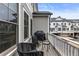 Balcony with black seating and a small table at 884 Mayfield Rd, Milton, GA 30009