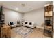 Finished basement with a rug, modern furniture, and stylish decorations at 884 Mayfield Rd, Milton, GA 30009