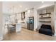 Modern kitchen with stainless steel appliances, a large island, and stylish pendant lighting at 884 Mayfield Rd, Milton, GA 30009