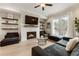 Modern living room with fireplace, hardwood floors and a comfortable seating area at 884 Mayfield Rd, Milton, GA 30009